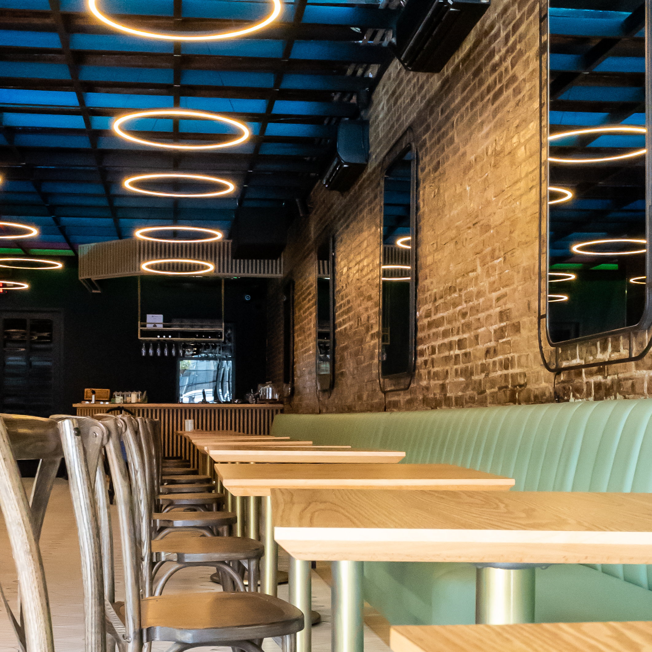 The indoor lounge at Kakes NYC, lit for the evening